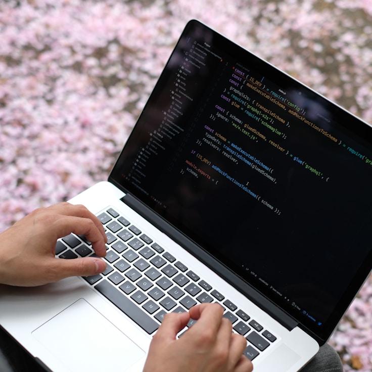 Mobile app project planning workspace with devices and development tools